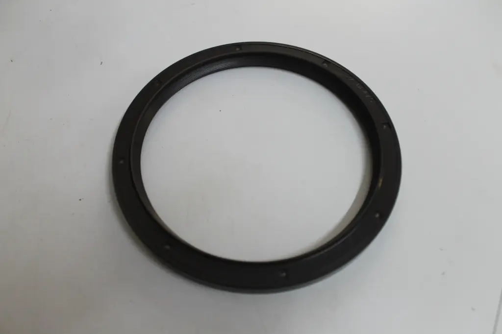 2418F475 = SEAL CRANKSHAFT REAR END.